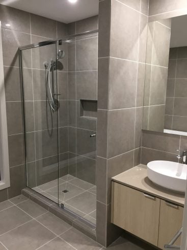 tiles floor to ceiling shower enclosure bathroom